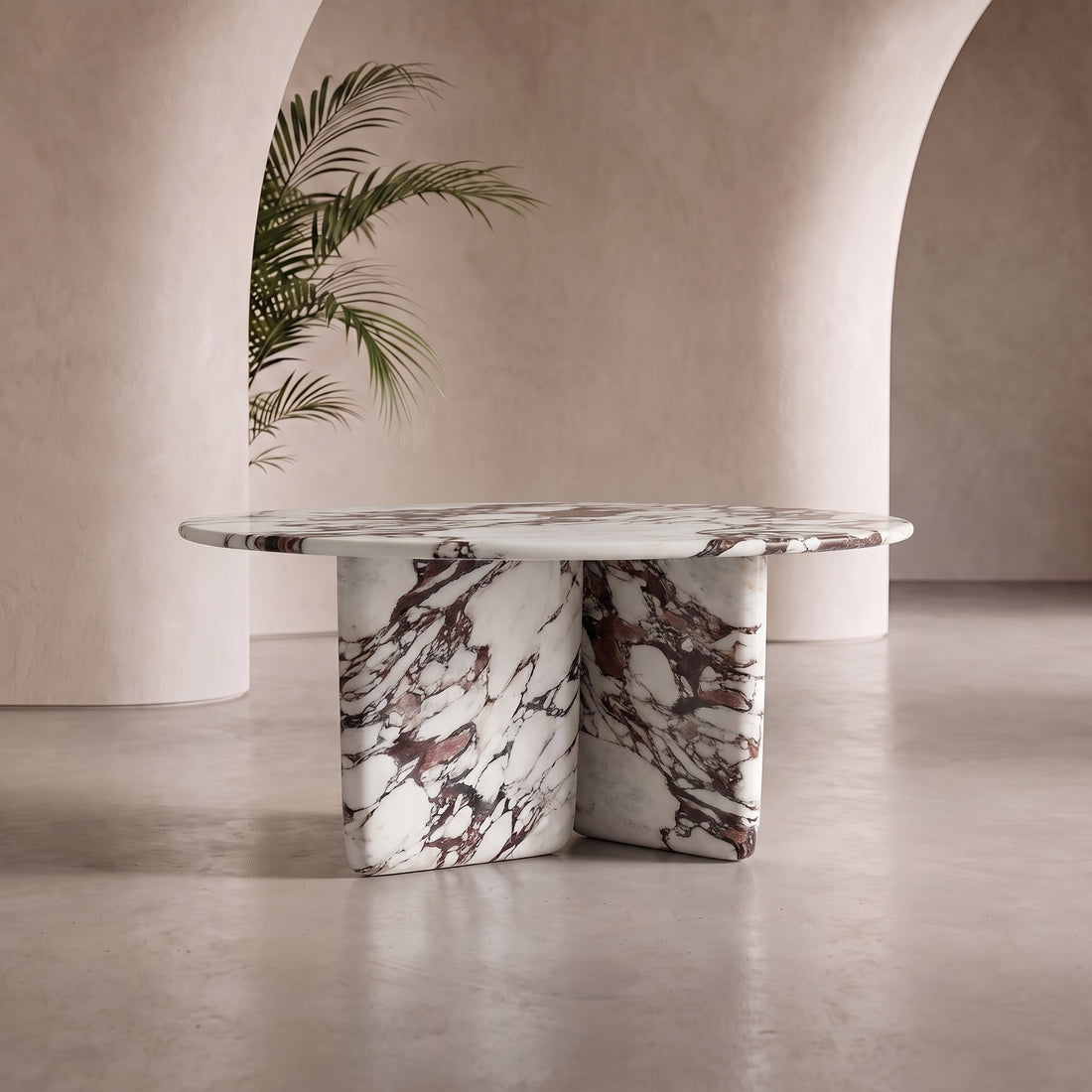 Round marble dining table in a dining room setting
